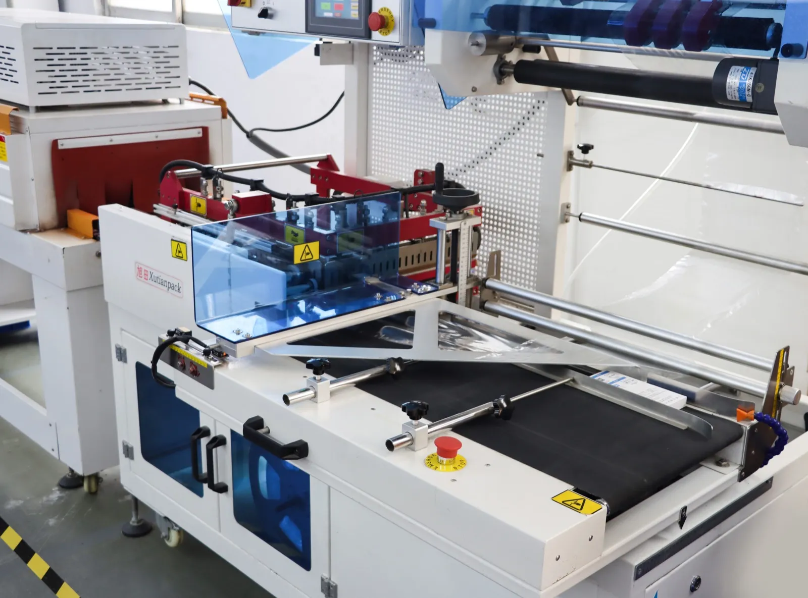 Packaging machine in the packaging workshop – Shenzhen Jiding Electronic Co., Ltd.